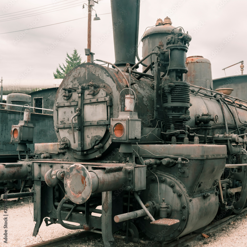 Vintage steam locomotive being restored illustrating hobby or vintage  industry or transportation technology.  