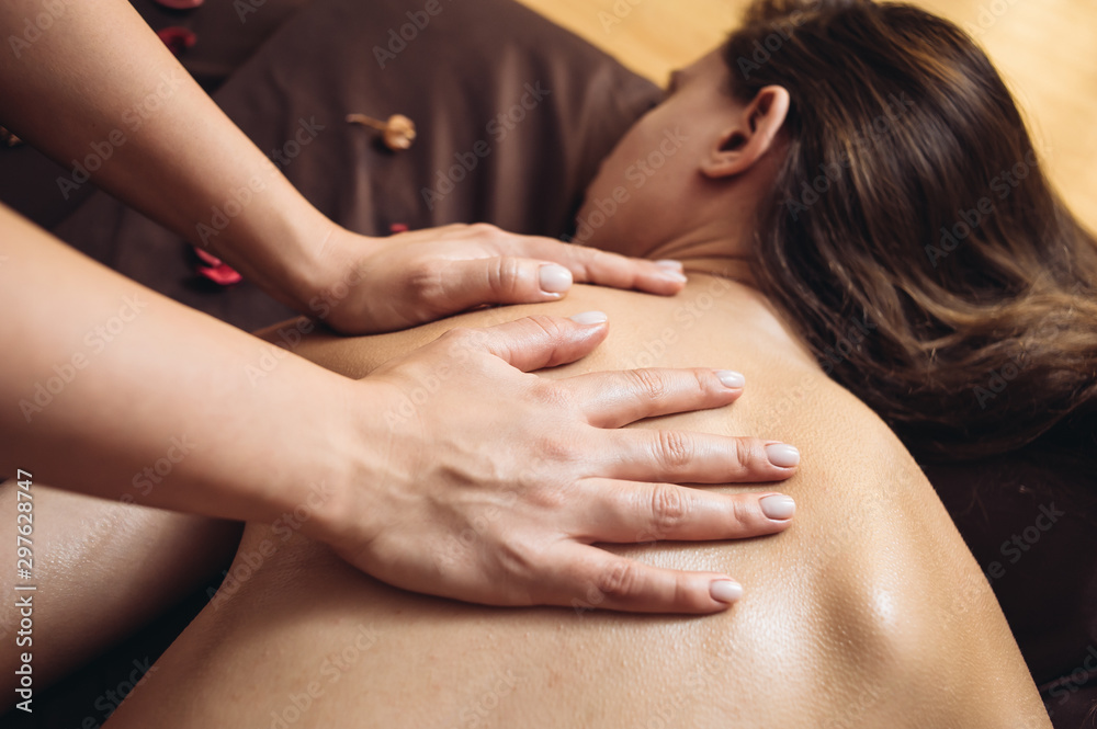 Fototapeta premium Aromatherapy massage is massage therapy using massage oil or lotion that contains essential oils 