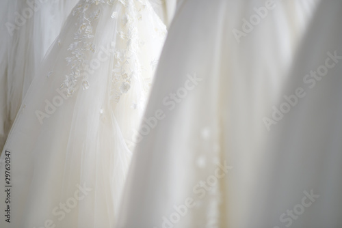 Stacked hanging white wedding dress