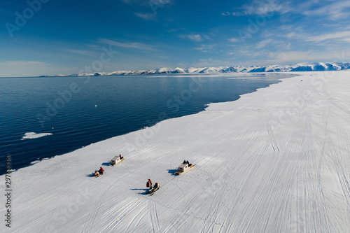 Obraz na płótnie Aerial drone photo of tourists visit the floe edge near Sirmilik National Park in Nunavut, Canadaa w salonie