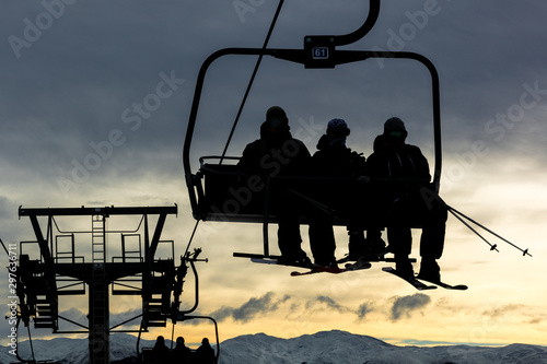 Skieurs use chair lift in the Ski resort of Font Romeu in the  Pyrenees mountains, France December 2017