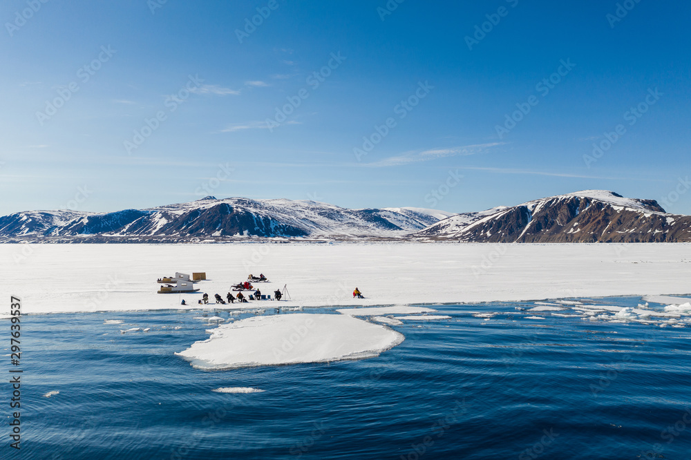 Tourists visit the floe edge near Sirmilik National Park in Nunavut, Canada
