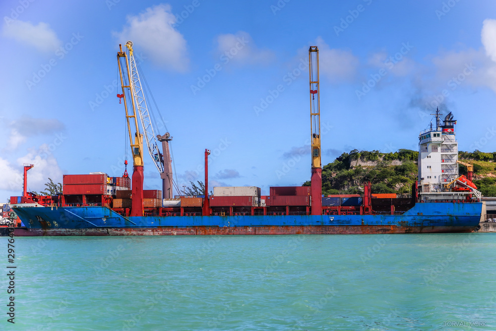 Container vessel at the pier of the commercial terminal of St John's Antigua