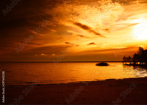 Dramatic sunset on beach landscape background