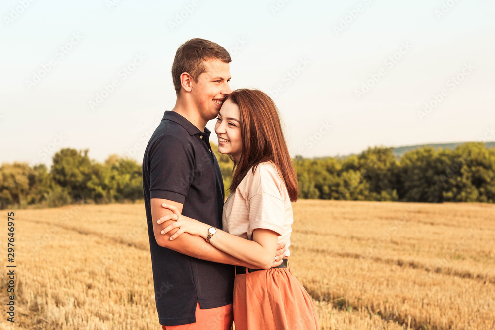 married couple walking in the field married couple walking in the field