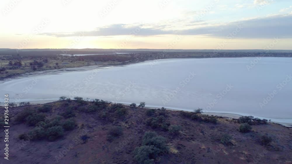 Forward flight towards salt lake in Australia at sunrise Forward flight towards salt lake in Australia at sunrise