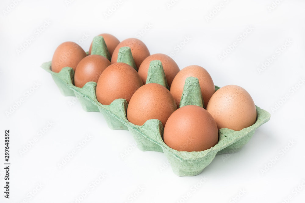 cardboard box with brown chicken eggs