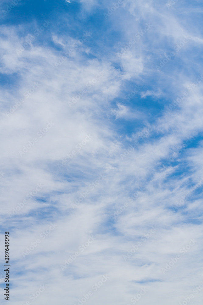 Naklejka premium White fluffy clouds in the blue sky in summer
