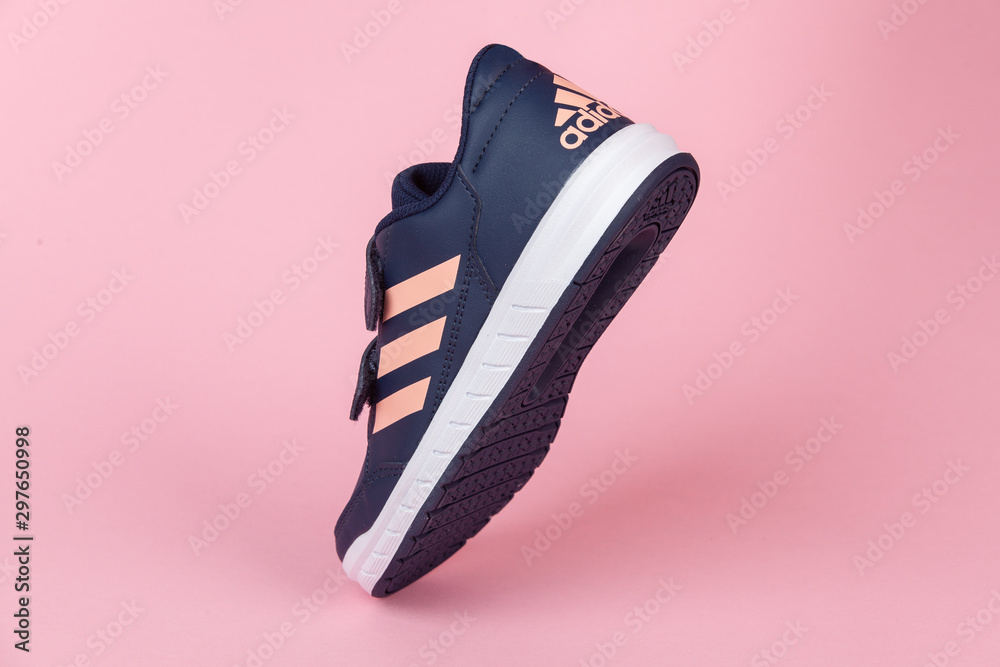 Verstikken gemak de studie Varna , Bulgaria - AUGUST 13, 2019 : ADIDAS ALTA SPORT shoe, on pink  background. Product shot. Adidas is a German corporation that designs and  manufactures sports shoes, clothing and accessories Stock 写真 | Adobe Stock