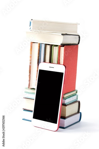 Stack of colored books and mobile phone, Mobile library in smartphone concept, audiobooks, Listening to e-books in audio format. Books online