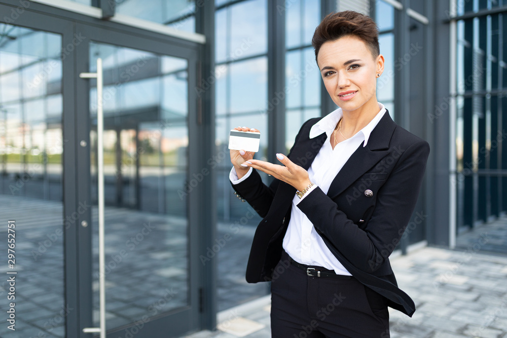 stylish business woman on the background of an office fashionable building stylish business woman on the background of an office fashionable building