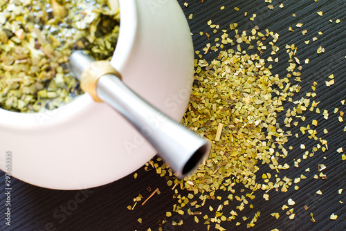 Yerba Mate in matero on a table, green tea © equos