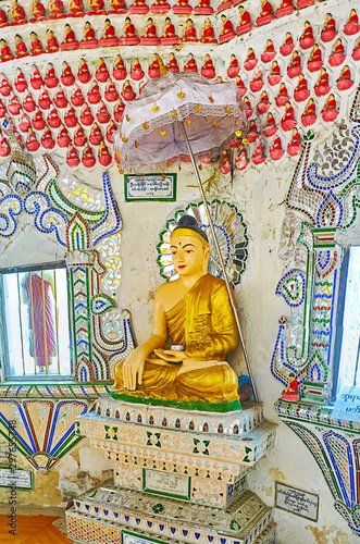 Buddha Touching Earth in Sein Yaung Chi Pagoda, Yangon, Myanmar photo