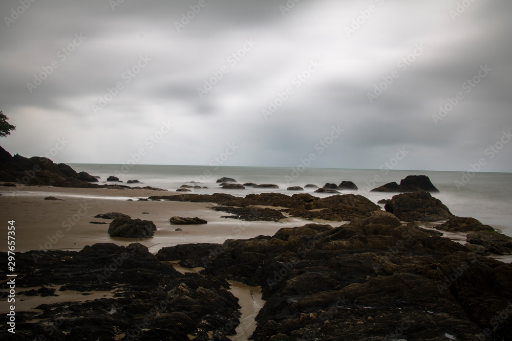 a rainy day at the beach of Etty Bay near Innisfail in North Queensland, Australia