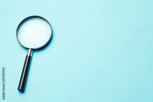 Magnifying glass. Search tool. Green background.