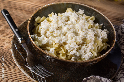 Fusilli pasta with cottage cheese, sugar and cinnamon.