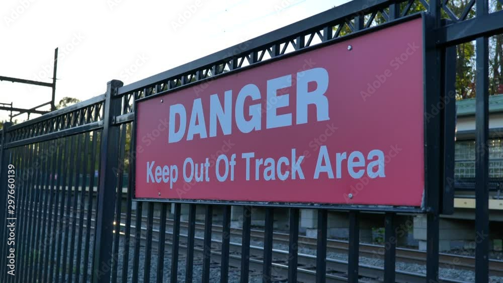 Danger keep out of track area sign sun reveal Danger keep out of track area sign sun reveal