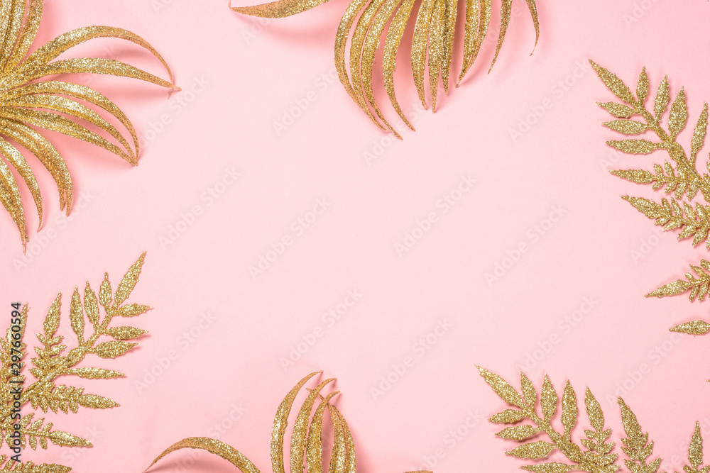 Golden Christmas flat lay background on pink.