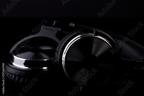 black headphones dark photographed glossy