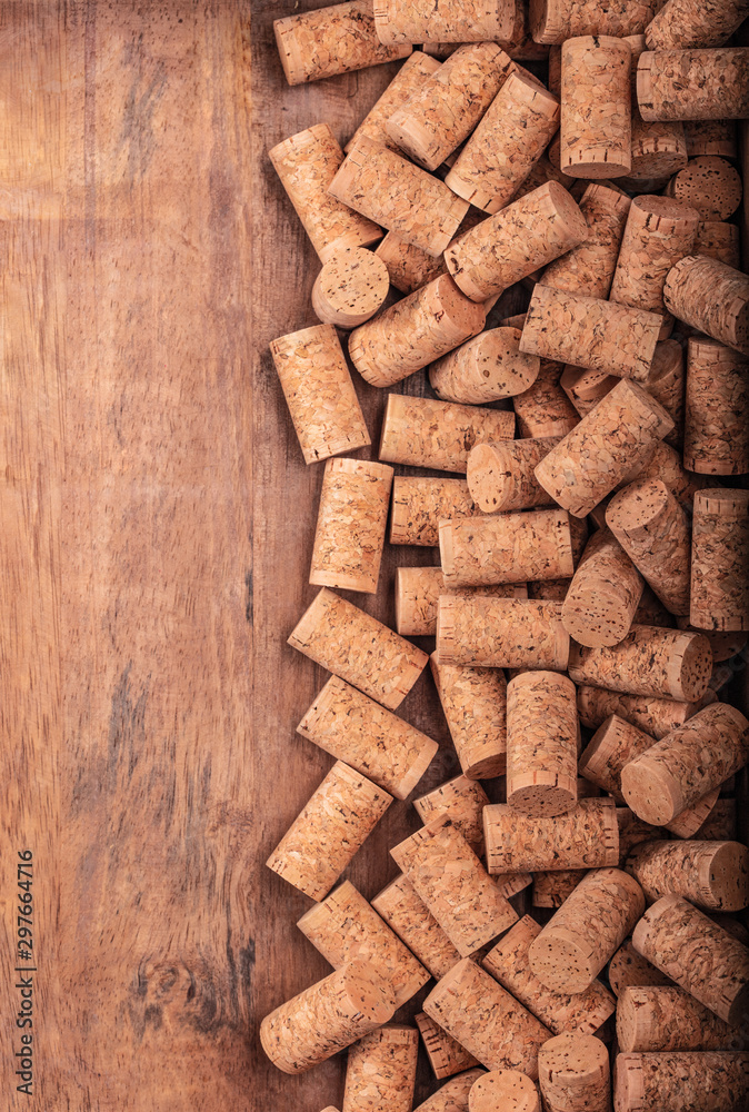 Black glass bottle of wine on corks and wood background Poster concept design photo shooting