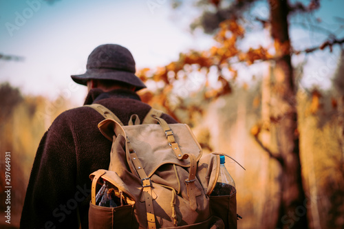 young guy with a vintage backpack in the forest. Ukraine © metr1c