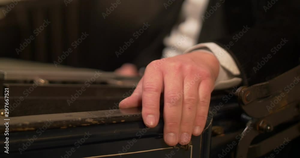Man hand trying to close the door of a very old car Man hand trying to close the door of a very old car