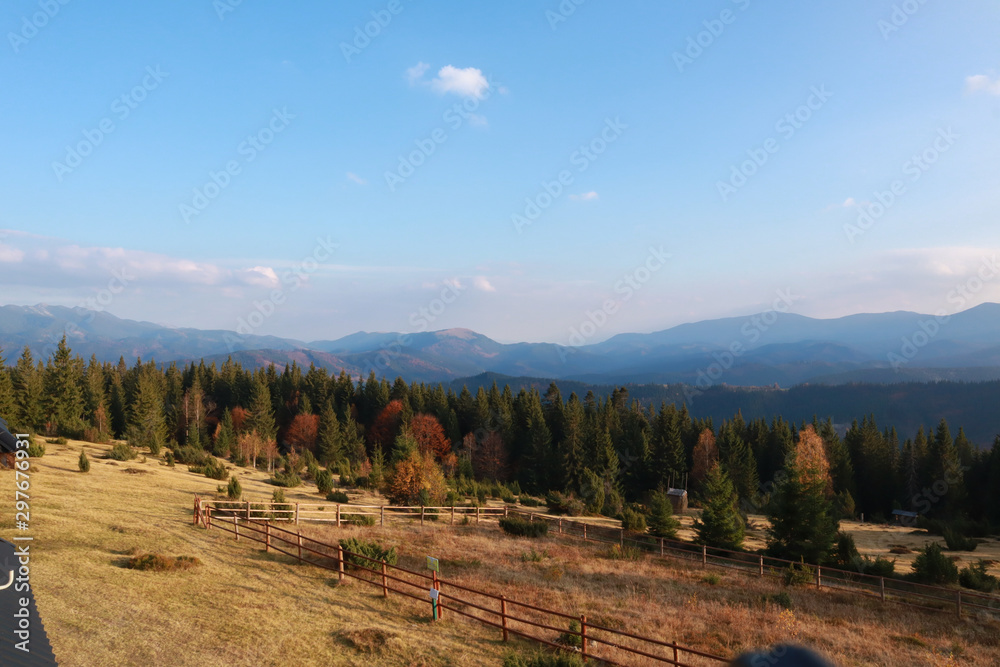 View of the autumn mountains. The village of Bystritsa. Ukraine. Ukrainian Carpathian Mountains.