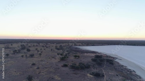 Slow rise over desert and lake and sunset in Australia photo