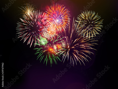 Colorful firework with bokeh background. New Year celebration  Abstract holiday background