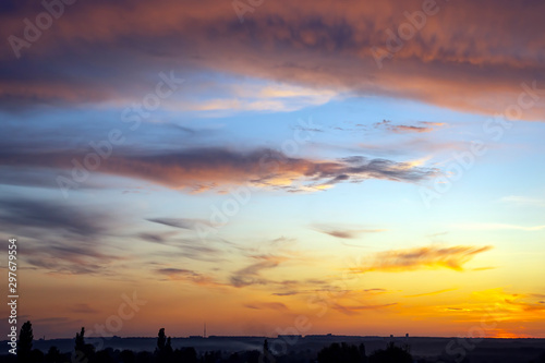 Colorful sunset in the evening sky. The nature and beauty of clouds © photosaint