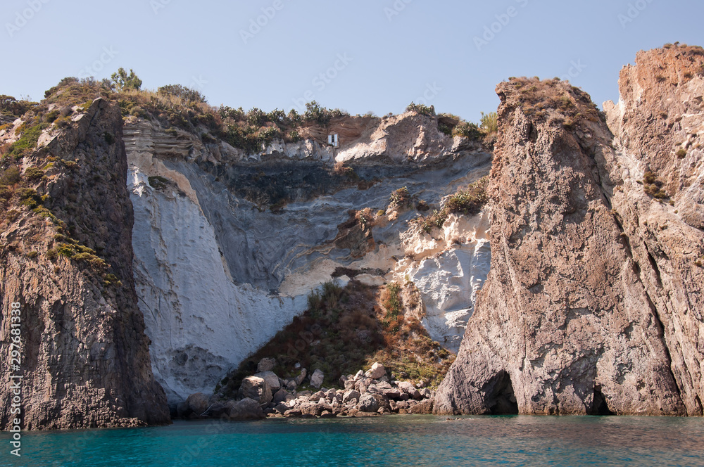 Fototapeta premium Rocks and cliffs in the Mediterranean sea of the island of Ponza, Lazio region, Italy.