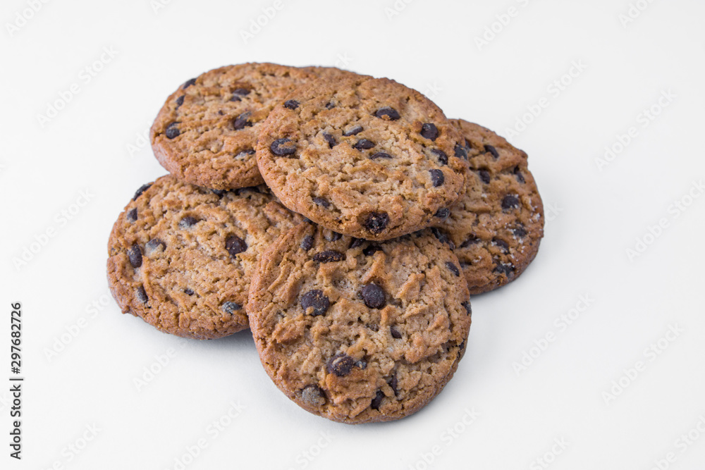 Homemade cookies with dark chocolate chips on white background Homemade cookies with dark chocolate chips on white background