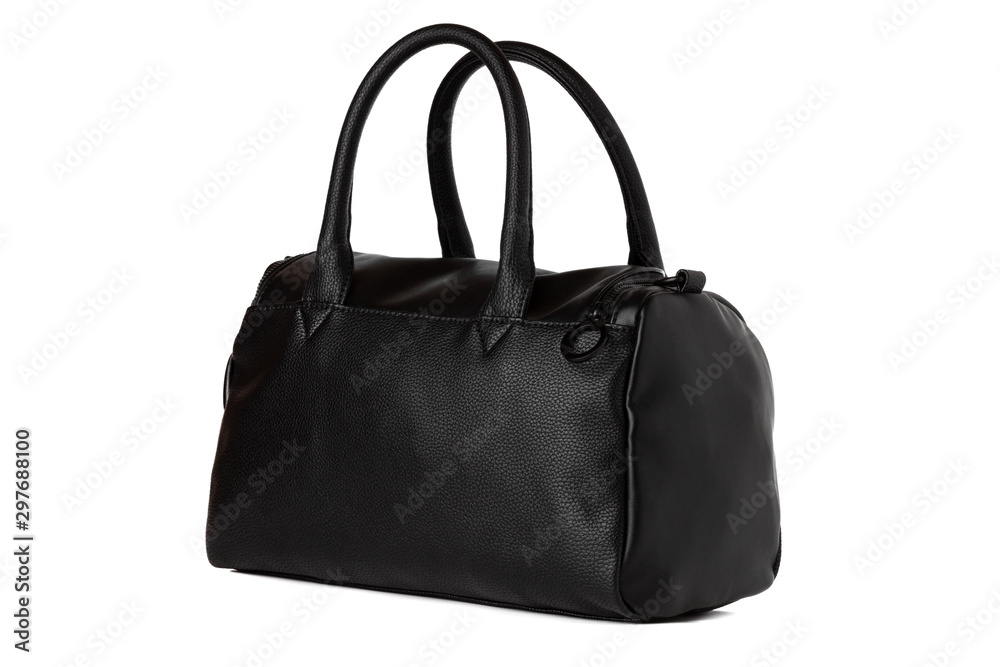Black bag on a white background. Leather bag close-up isolated on a white background. Black bag on a white background. Leather bag close-up isolated on a white background.