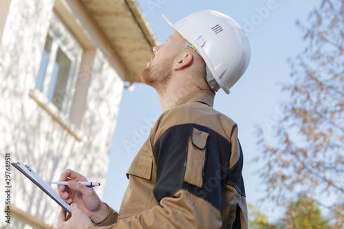 building manager writing the list