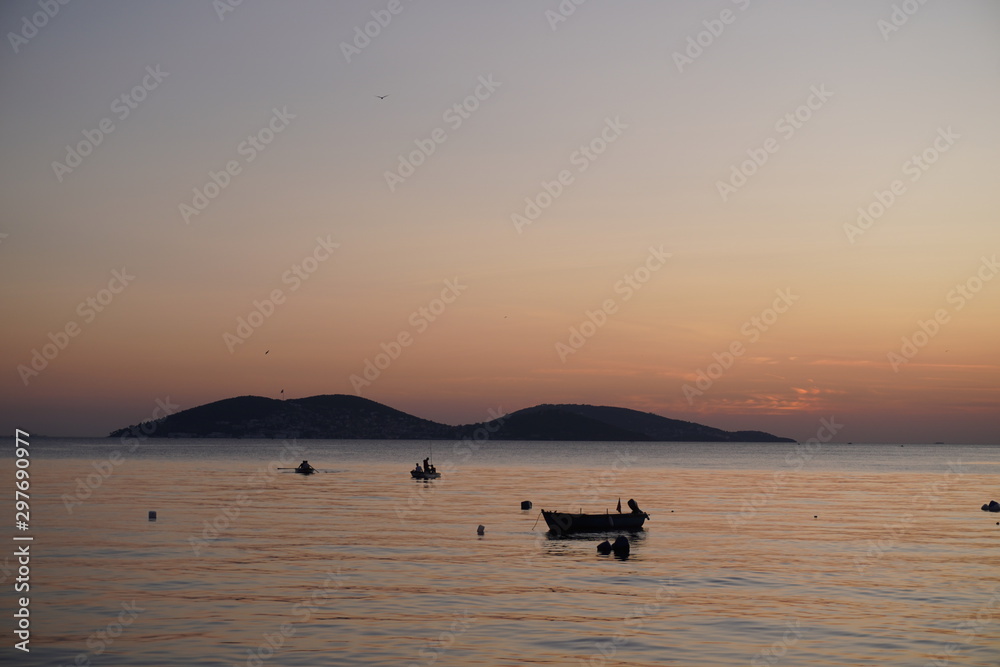 fishing boat, boats and people on Sunset Beach