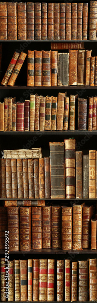 old books on wooden shelf old books on wooden shelf