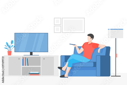 Guy watching television flat vector illustration. Young man sitting on comfortable couch holding remote cartoon character. Indoor rest, media recreation, modern leisure activity. Apartment interior.