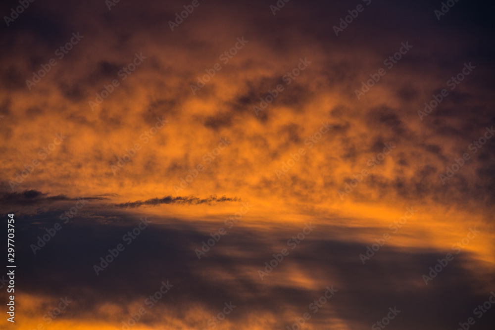 Abstract beautiful sunrise and dramatic clouds on the sky.