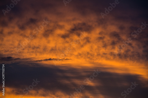 Abstract beautiful sunrise and dramatic clouds on the sky.