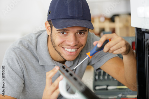 Fotografie happy handy man home repair