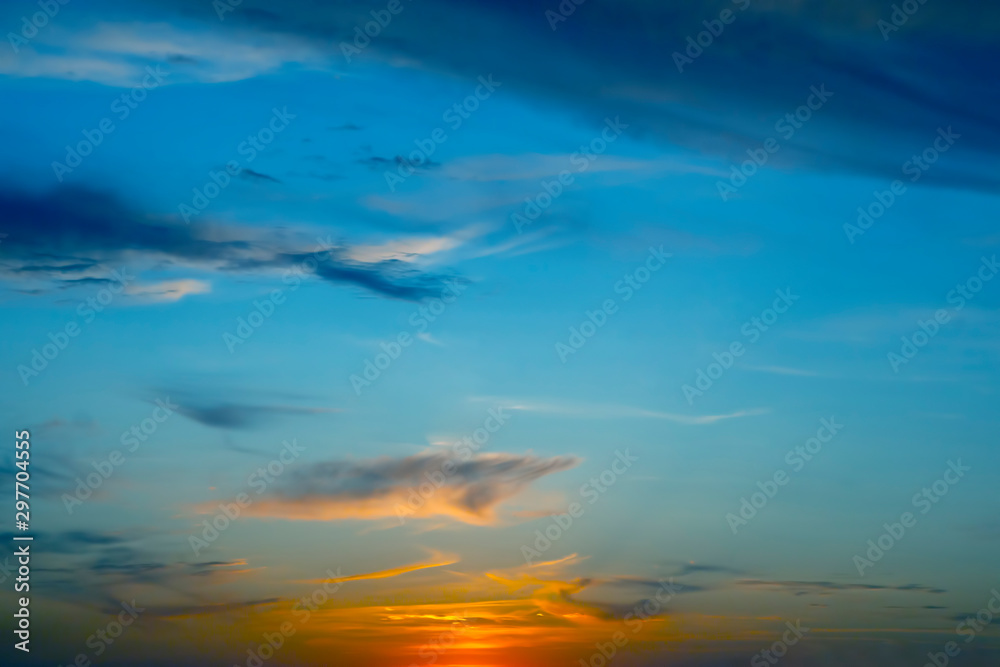 Colorful sunset in the evening sky. The nature and beauty of clouds