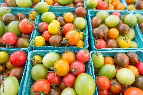 Baskets of multicolored cherry tomatoes