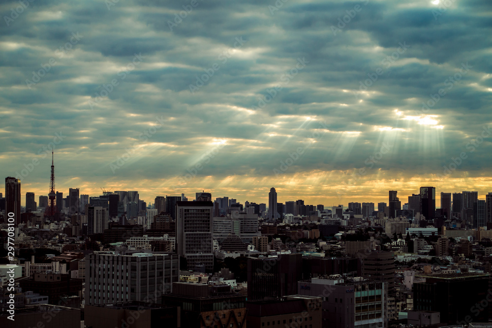 Obraz premium Skyscraper in Tokyo with Ray of the light, Sunbeam, Silver lining.