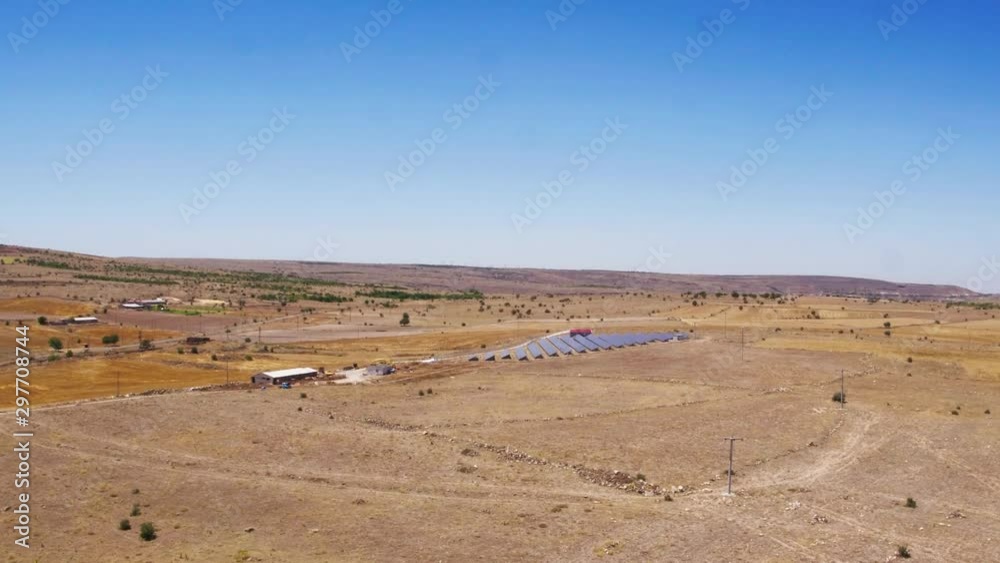 Small Solar station on agriculture in hot dry climate in Turkey, power plants, panels farm at summer sunny day - Aerial drone view Small Solar station on agriculture in hot dry climate in Turkey, power plants, panels farm at summer sunny day - Aerial drone view
