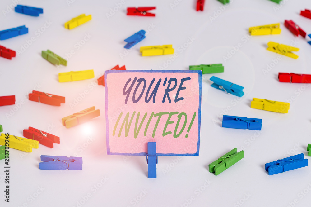 Text sign showing You Re Invited. Business photo text make a polite friendly request to someone go somewhere Colored clothespin papers empty reminder white floor background office Text sign showing You Re Invited. Business photo text make a polite friendly request to someone go somewhere Colored clothespin papers empty reminder white floor background office