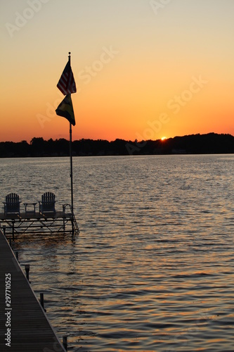 lake sunset with flags © Jeremiah