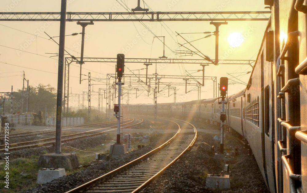 Fototapeta premium Indian railway train,view from window at dawn,Tamil Nadu,India.