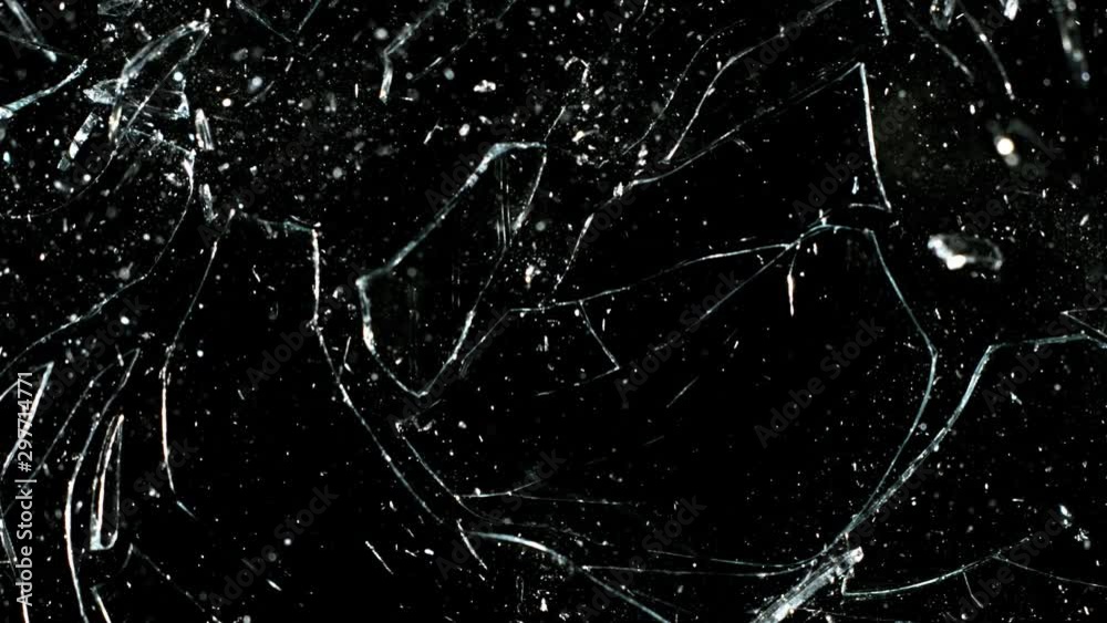 Real glass break in super slow motion shooted with high speed cinema camera at 2000 fps. Isolated on black.