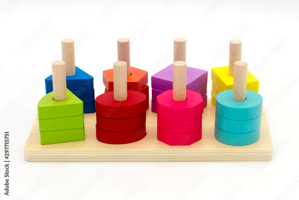 Wooden educational toy set for children on a white background. Wooden educational toy set for children on a white background.