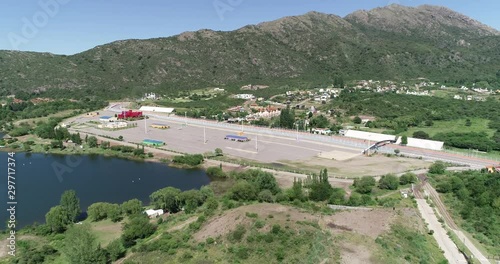 Aerial drone scene of pitstop infraestructure for car racetracks. Senital empty space for car competitions. Potrero de los Funes, San Luis, Argentina